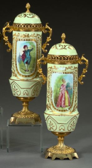 Appraisal: Pair of French Gilt-Brass-Mounted Pale Citron-Ground Porcelain Cylindrical Two-Handled Covered