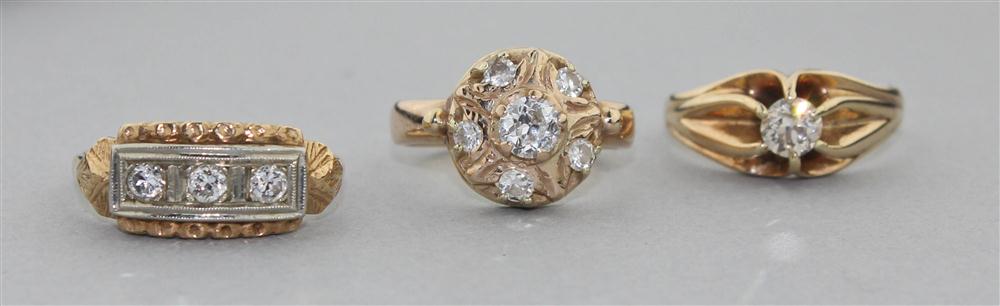 Appraisal: THREE DIAMOND RINGS IN K YELLOW GOLD the multi-diamond ring