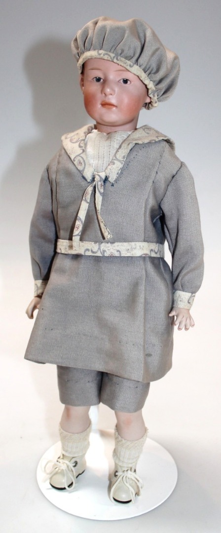 Appraisal: A late thC early thC bisque headed male doll probably