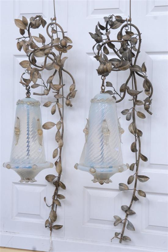 Appraisal: PAIR OF SCONCES Wrought iron with floral fruit and bird