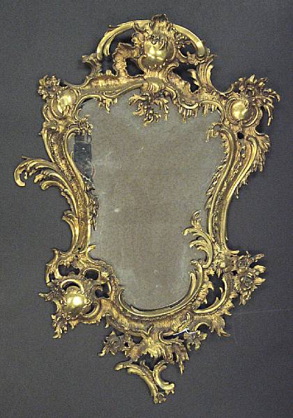 Appraisal: A Rococo Revival cast brass mirror early th century height