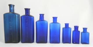 Appraisal: cobalt poison bottles Poison- cobalt rectangular all embossed on front