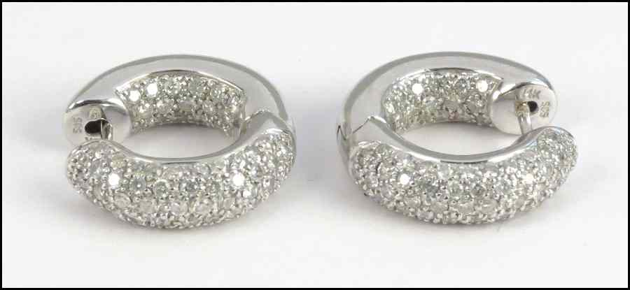 Appraisal: PAIR OF KARAT WHITE GOLD AND DIAMOND HOOPS Diamonds approx