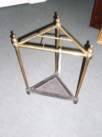 Appraisal: AN EDWARDIAN BRASS CORNER UMBRELLA STAND