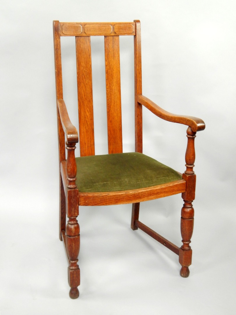 Appraisal: A 's medium oak open armchair with drop in seat