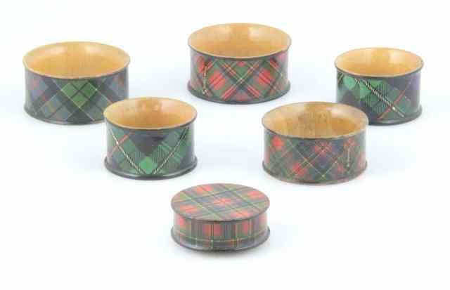 Appraisal: Five Mauchline ware tartan napkin rings one McPherson one Prince