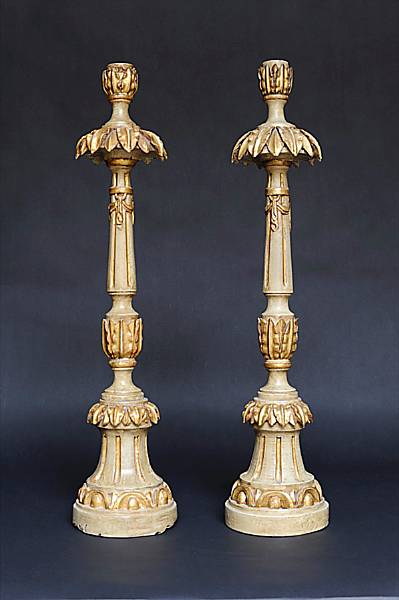 Appraisal: A pair of Portuguese Neoclassical painted and parcel gilt candlesticks