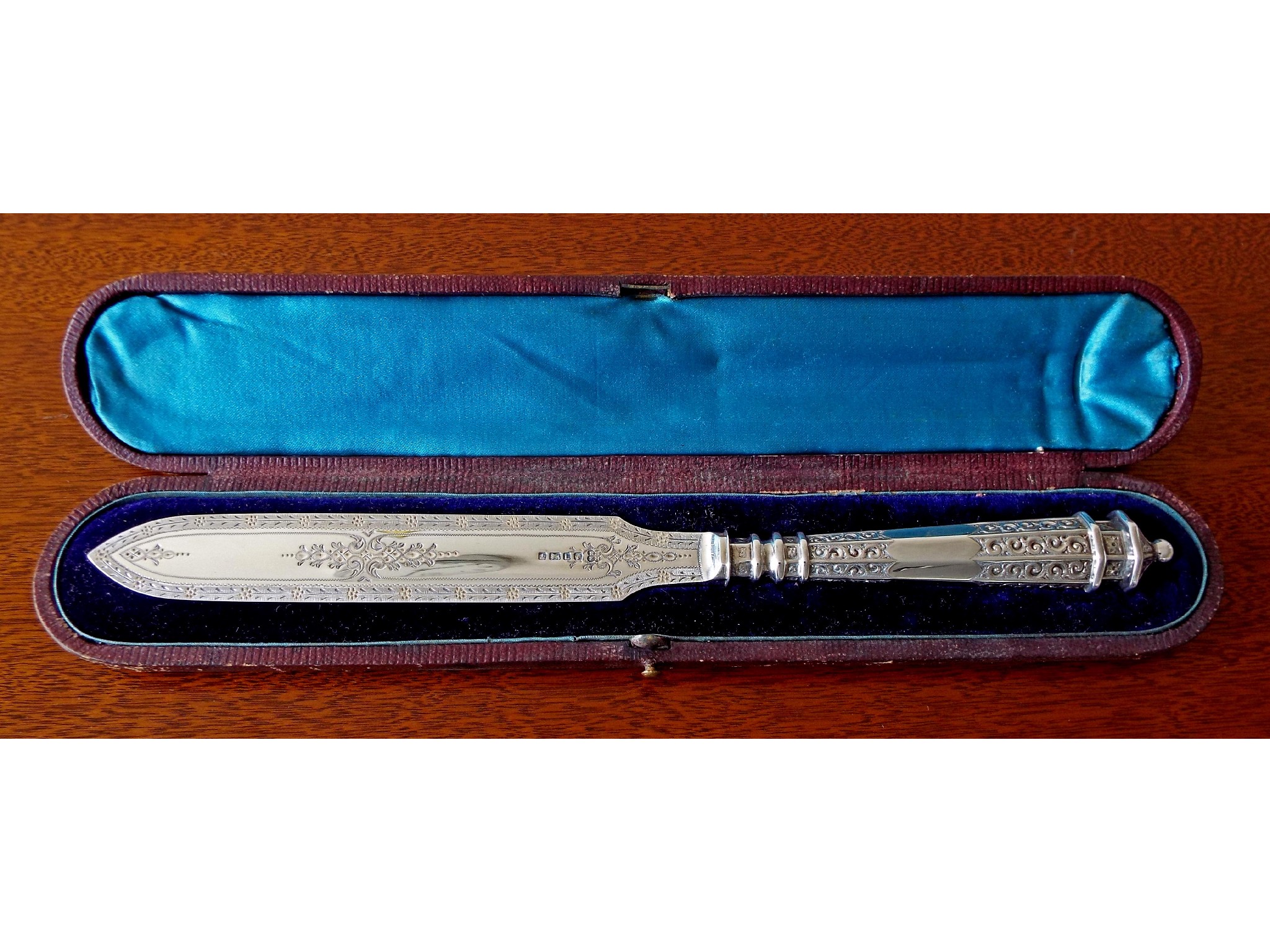 Appraisal: Victorian silver letter knife with pagoda finial and faceted handle