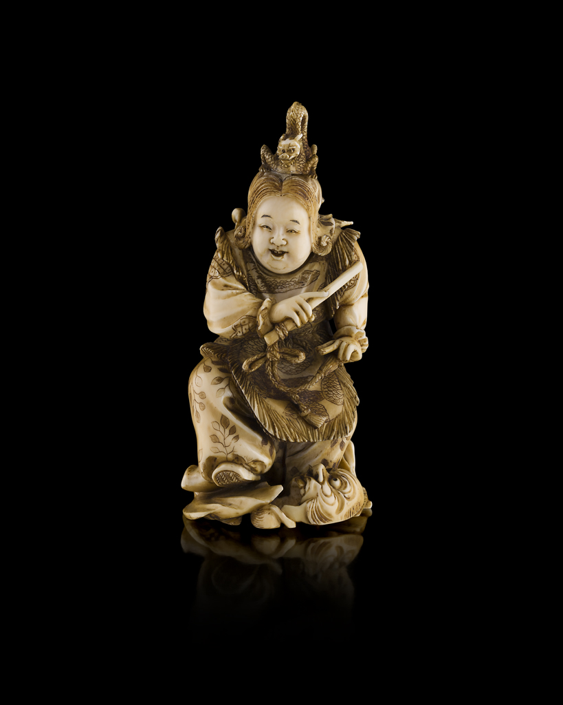 Appraisal: YCARVED IVORY OKIMONO OF AN ACTOR MEIJI PERIOD the actor