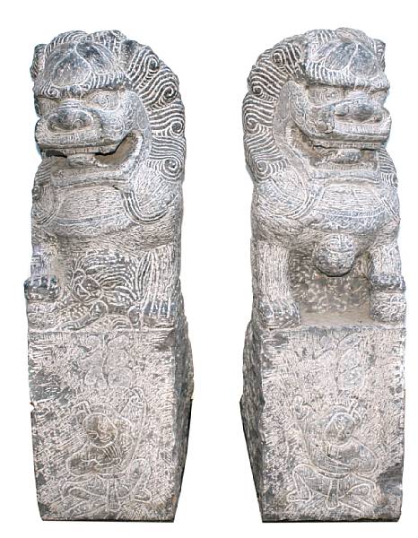 Appraisal: A pair of Chinese carved stone figures of fu dogs