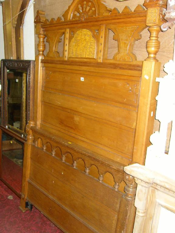 Appraisal: A substantial Victorian ash wood single bed the high headboard