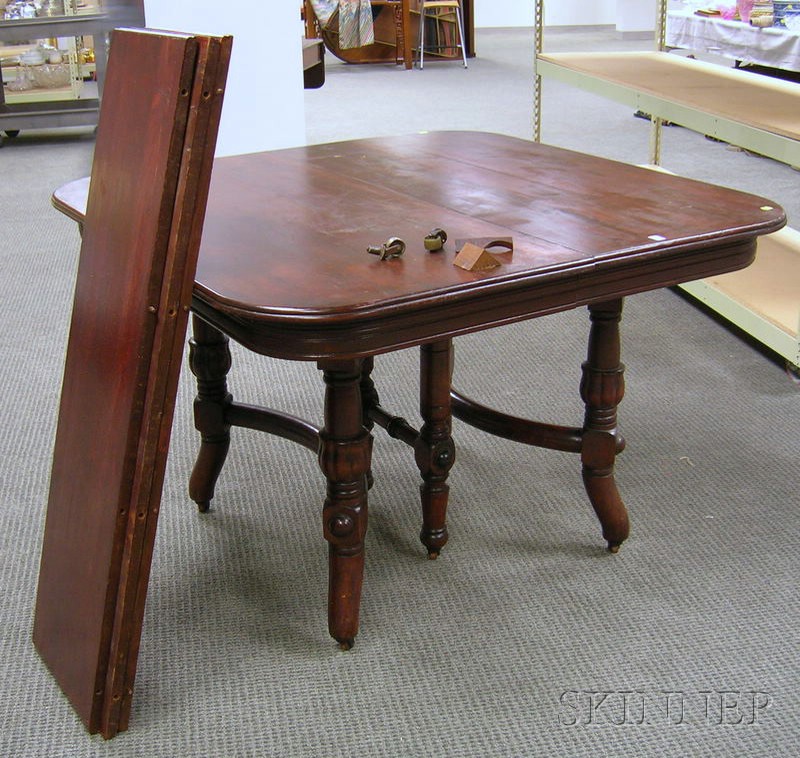 Appraisal: Late Victorian Carved Cherry Dining Table with three leaves ht