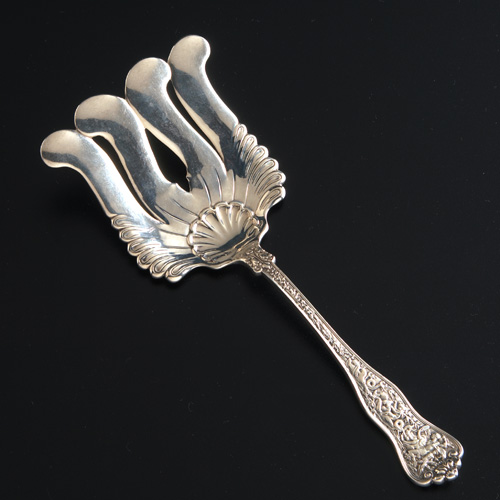 Appraisal: Tiffany Co Olympian pattern silver asparagus fork ca ozs troy