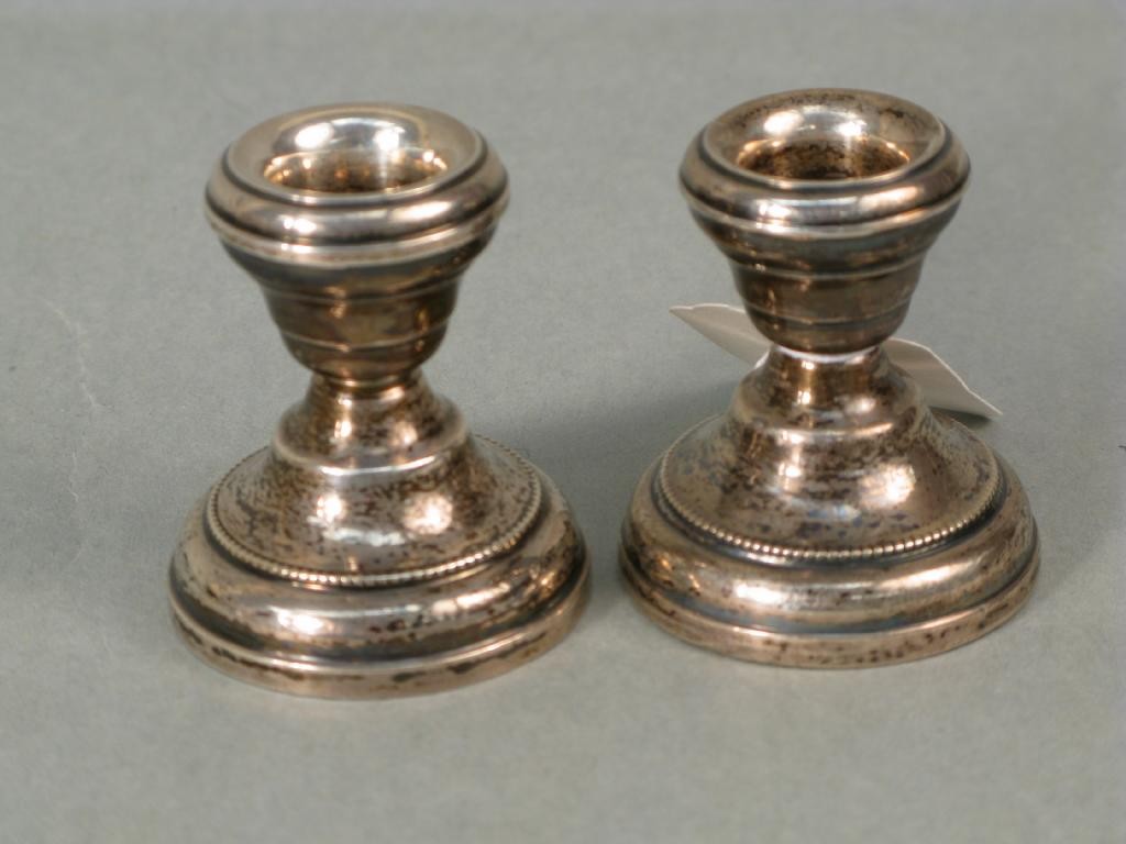 Appraisal: A pair of silver tapersticks Birmingham in