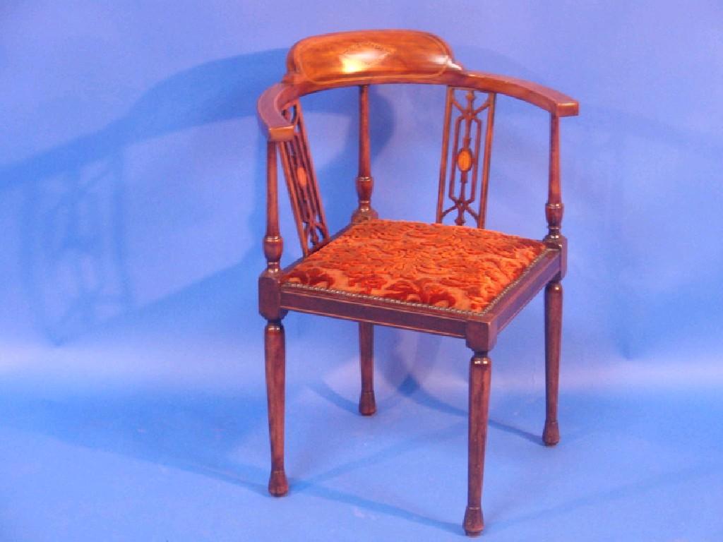 Appraisal: A thC inlaid mahogany corner chair with pierced rectangular back