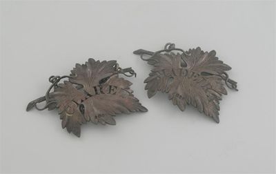 Appraisal: A pair of George IV vine leaf labels with texturing