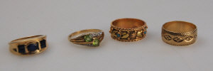 Appraisal: Collection of four rings including one set five sapphire stamped