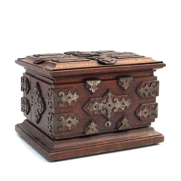 Appraisal: An oak and steel mounted tantalus box height in width