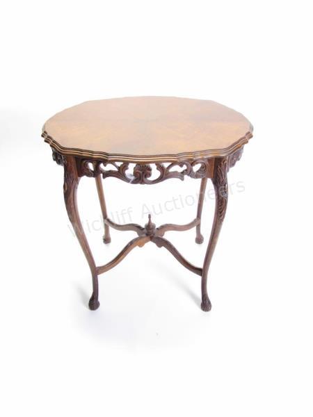 Appraisal: An antique French style lamp table with stretcher base and