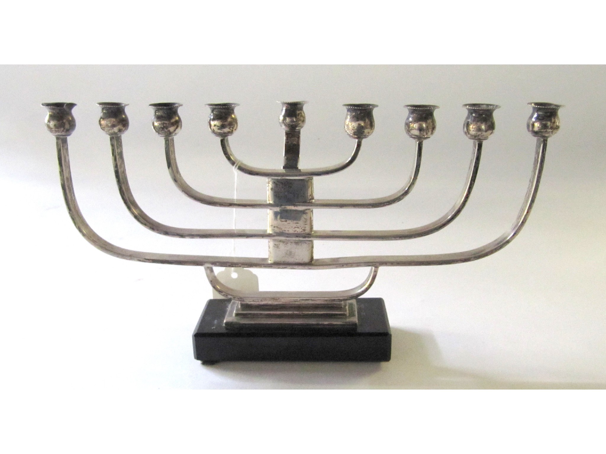 Appraisal: A silver menorah on weighted base Sheffield