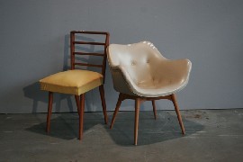 Appraisal: A retro chair in grey vinyl t w another side