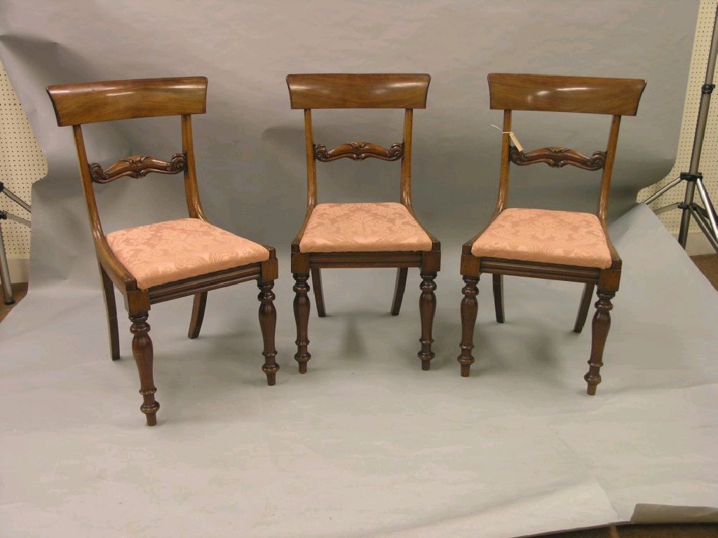 Appraisal: A set of three William IV mahogany dining chairs with