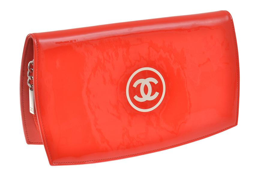 Appraisal: A ZIP WALLET BY CHANEL Styled in tangerine patent leather