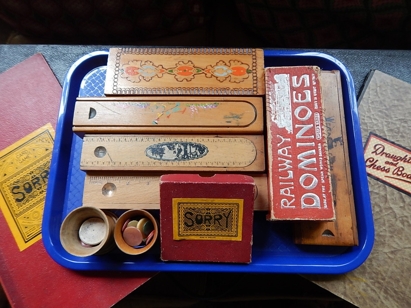 Appraisal: A collection of treen pencil boxes dominoes chess board etc