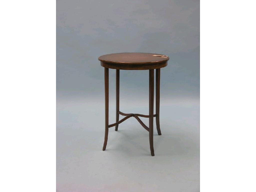 Appraisal: An Edwardian mahogany occasional table circular top with inlaid leaf-scrolls