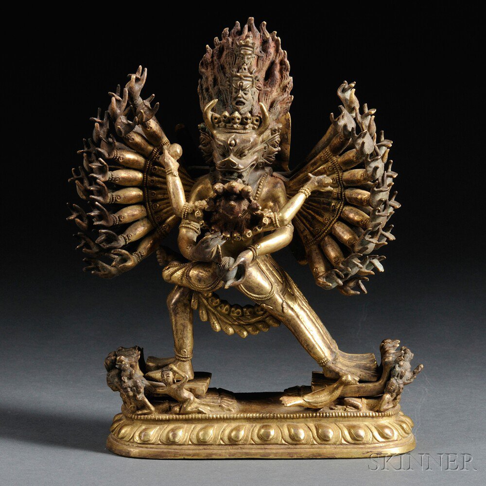 Appraisal: Gilt-bronze Figure of Mahakala and Consort Sino-Tibet the deity cast