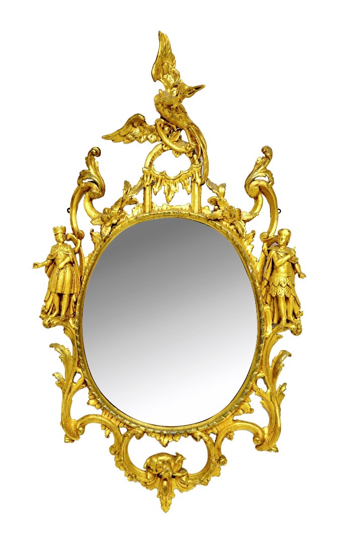 Appraisal: An early George III giltwood oval mirror in the manner