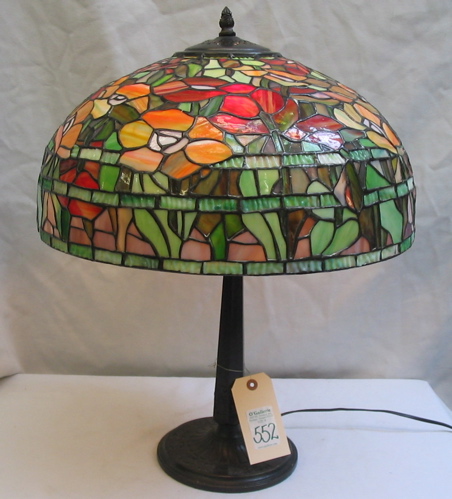 Appraisal: TIFFANY STYLE STAINED AND LEADED GLASS TABLE LAMP having a