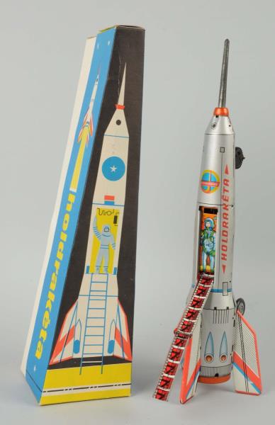 Appraisal: Holdraketa Tin Litho Friction Space Rocket Toy In original box