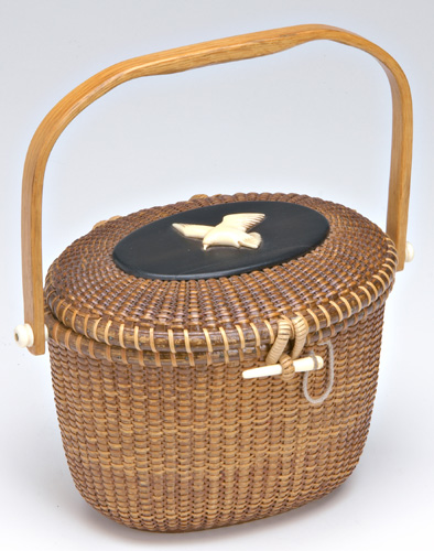 Appraisal: NANTUCKET RATTAN Jos Formosa Reyes - oval lidded basket purse