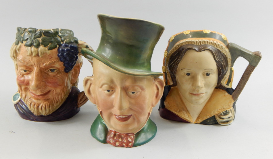 Appraisal: Three character jugs Royal Doulton Bacchus Catherine Howard and Beswick