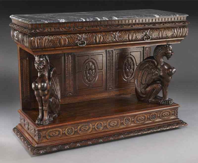 Appraisal: Highly carved marble top walnut credenzawith grey and white marble