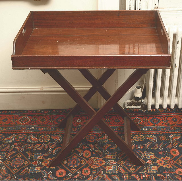 Appraisal: A TH CENTURY MAHOGANY BUTLERS TRAY on later folding stand