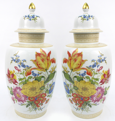 Appraisal: PAIR OF GERMAN KAISER PORCELAIN COVERED URNS in a Dresden