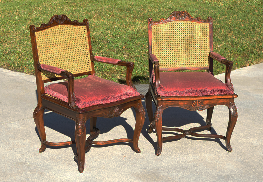 Appraisal: FRENCH STYLE CANED BACK ARM CHAIRS Top rails carved with