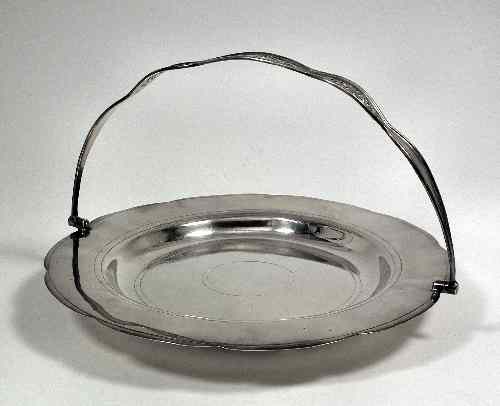 Appraisal: A Continental silver circular cake dish with shaped rim and