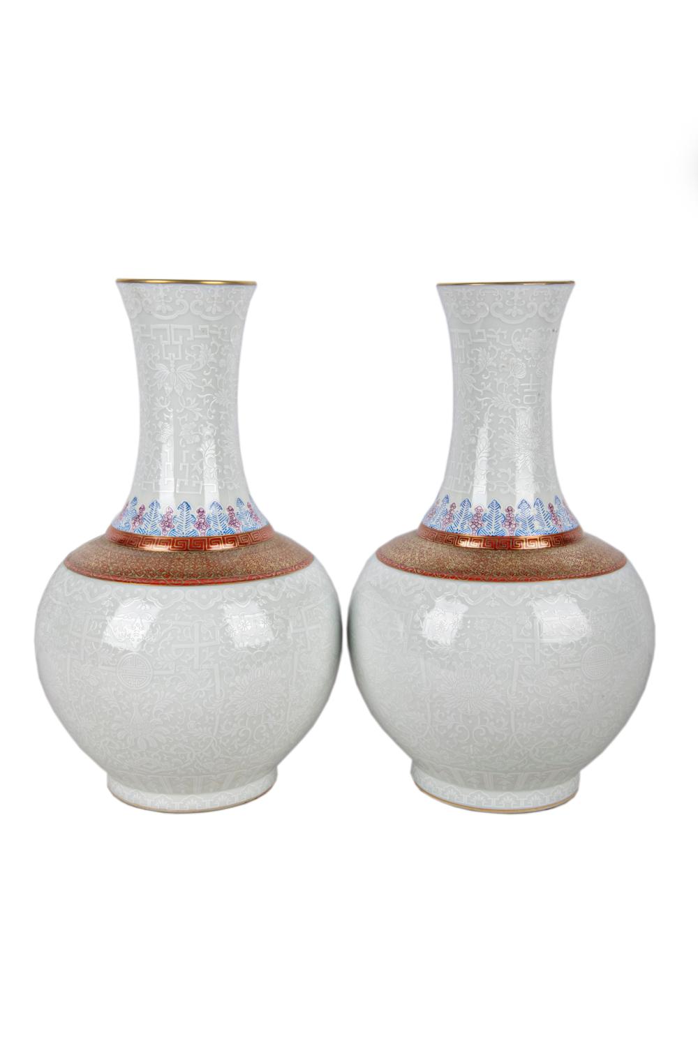 Appraisal: PAIR OF BLANC DE CHINE IRON RED PORCELAIN VASES th