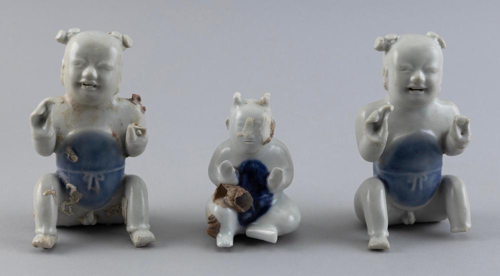 Appraisal: THREE CHINESE BLUE AND WHITE PORCELAIN HO-HO BOY FIGURES CIRCA