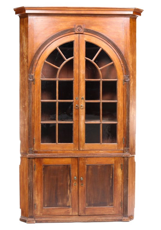 Appraisal: AMERICAN ARCHITECTURAL CORNER CUPBOARD Early th century poplar Two piece