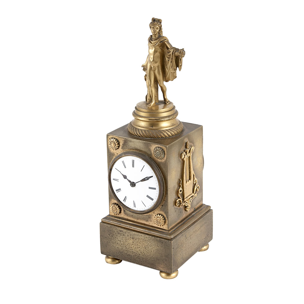 Appraisal: Empire Gilt-Bronze Desk Clock th Century The enameled dial with