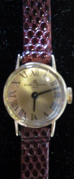 Appraisal: Lady's karat yellow gold wristwatch Baume MercierCircular case gold tone