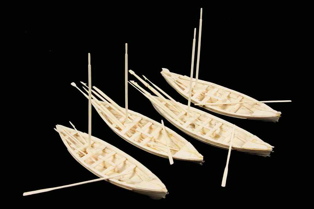 Appraisal: SAILOR-MADE WHALEBOAT MODELS - Four th c Carved Ivory Whaler's