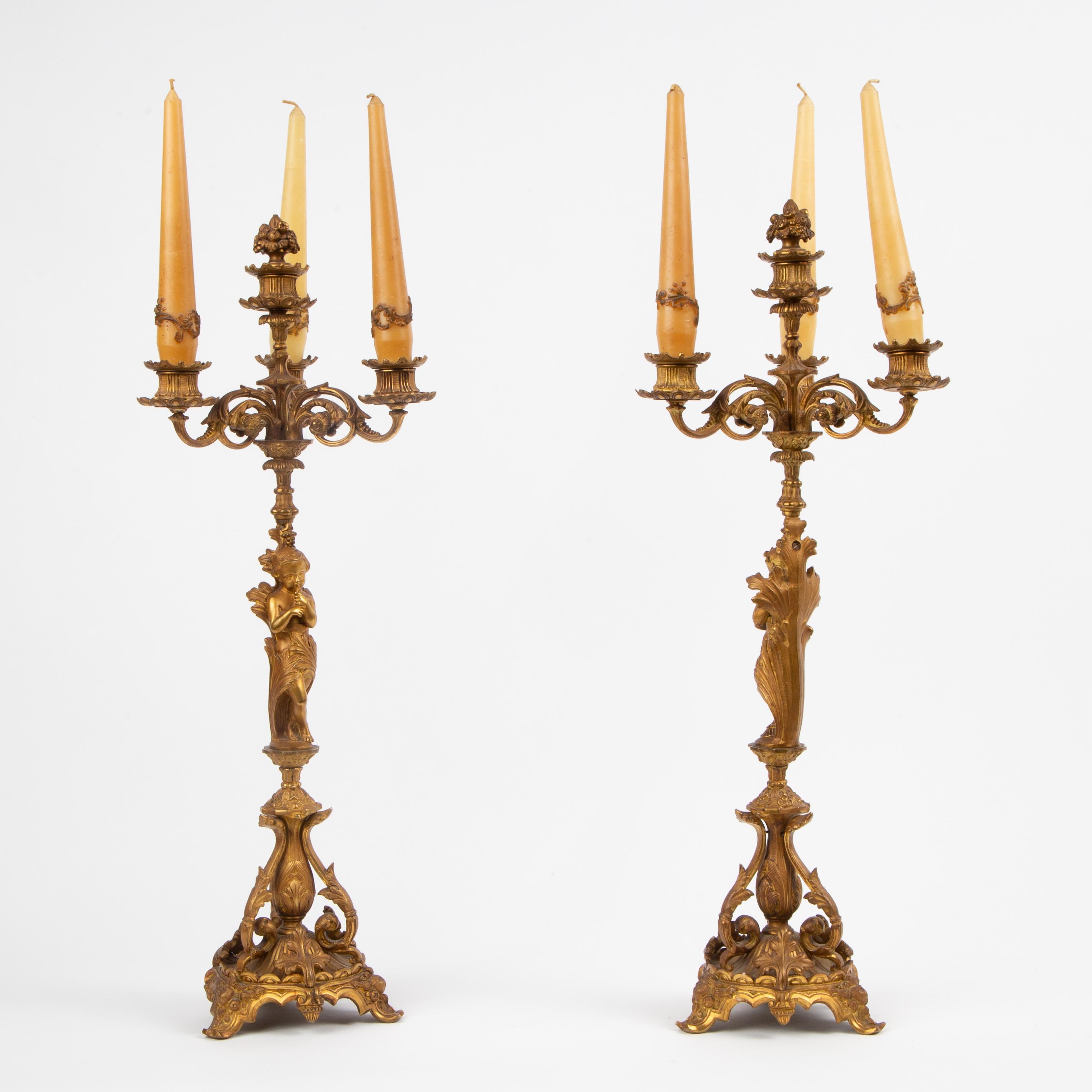 Appraisal: TH C GILT BRONZE CANDELABRA PAIR A nicely cast matched