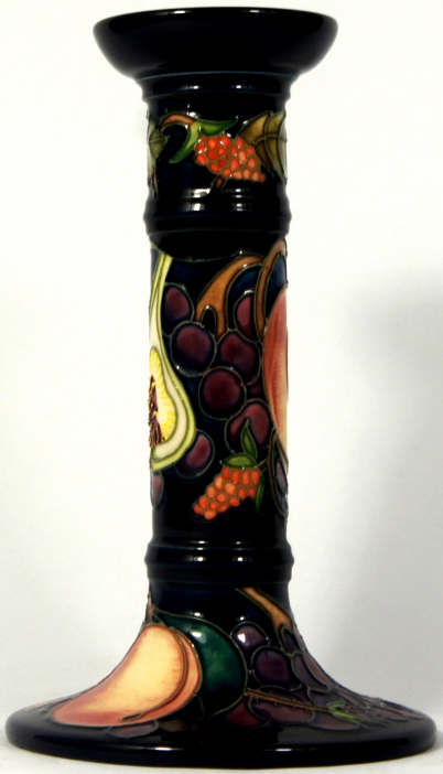 Appraisal: Moorcroft Candlestick in Fruit and Berry Design height cm restoration