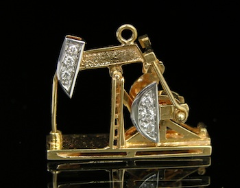 Appraisal: Yellow Gold and Diamond Oil Rig Charm k yellow gold