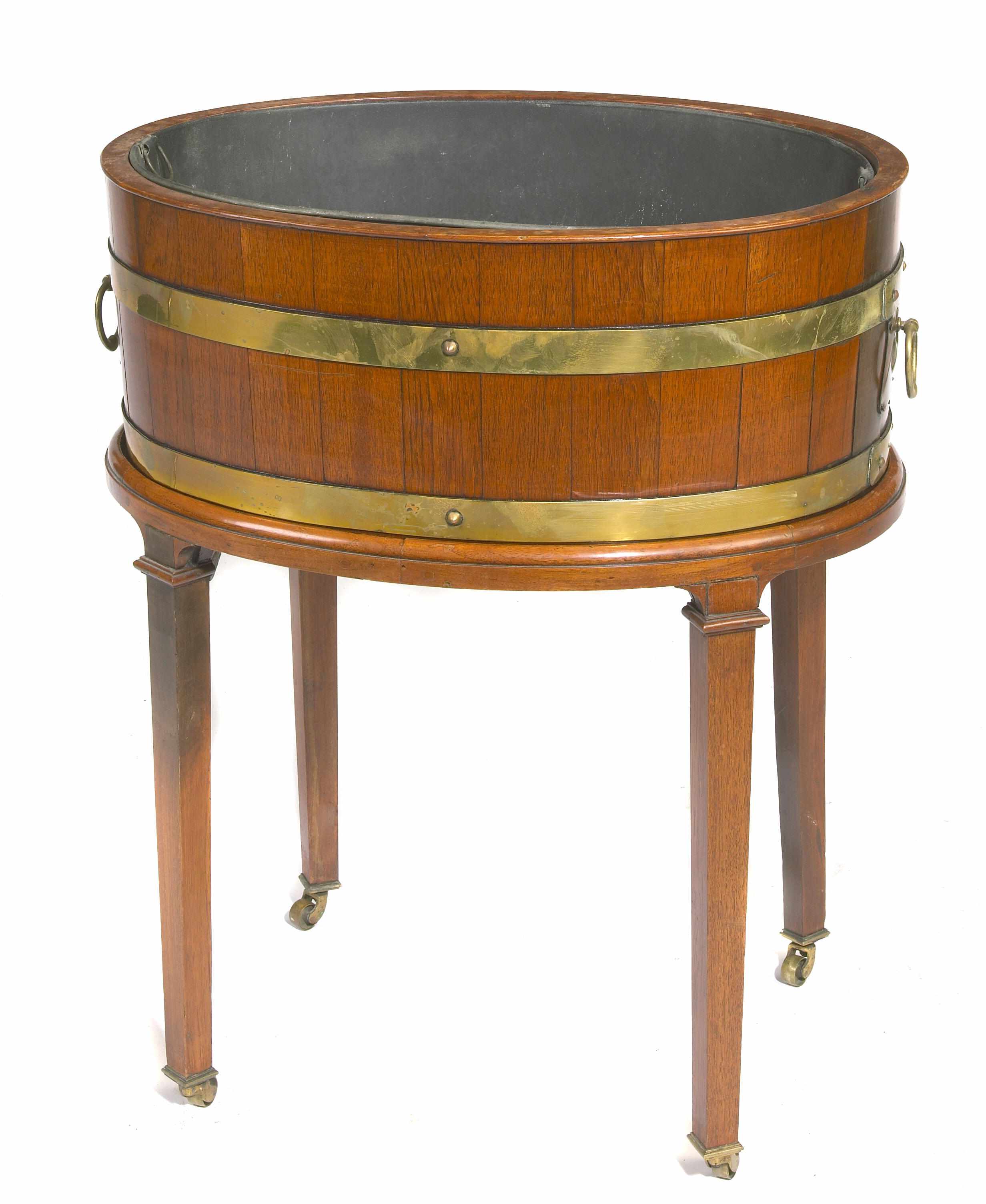 Appraisal: A George III style brass bound mahogany wine cooler on